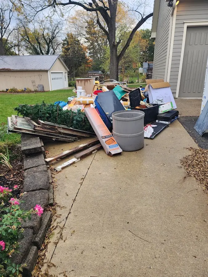 Dumpster being loaded with debris for Demolition Dumpster Rental in East Pennsboro